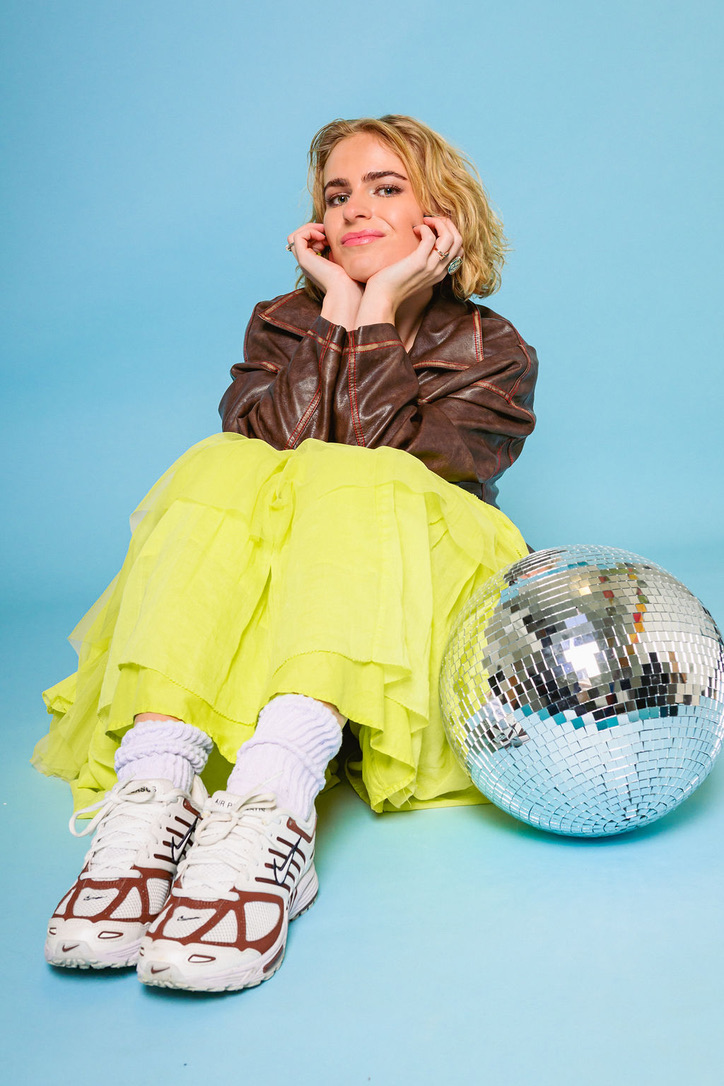 heather now, sitting with a disco ball